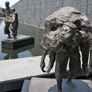 600px-A_13-year-old_boy_carries_his_dead_grandmother,_Nanjing_Massacre_Memorial_Hall_(flickr_9108543110) From Japan Focus