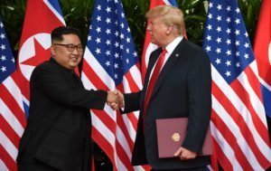 Trump-Kim-handshake-rtr-img Non-US-centric reporting on Kim-Trump summit